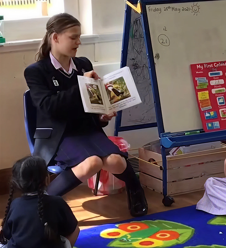 Athena, age 11, reading her original "What If Birds Wore Shoes?" — 2021